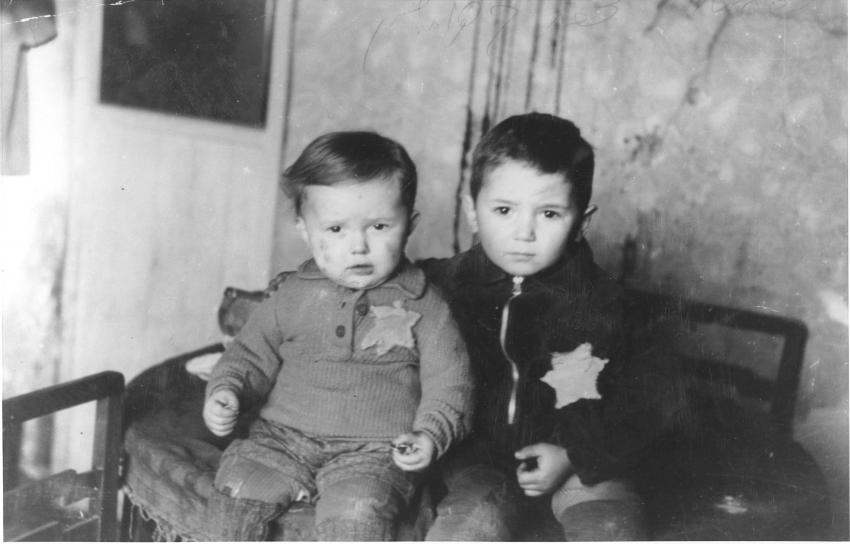 Kovno, Lithuania, February 1944 - Avraham Rosenthal, aged 5 and his two year old brother Emanuel